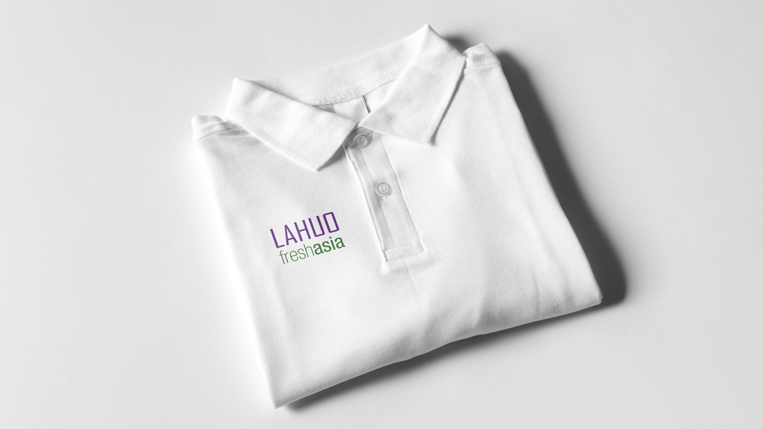 Poloshirt mit gesticktem Lahuo-freshasia-Logo für das Team.